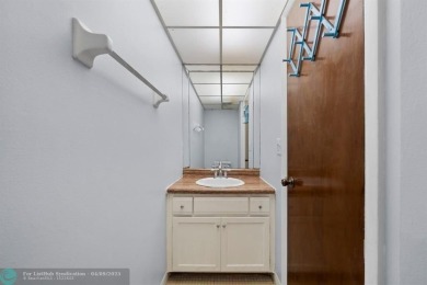 Charming & affordable condo in the desirable guard gated on Inverrary Country Club in Florida - for sale on GolfHomes.com, golf home, golf lot