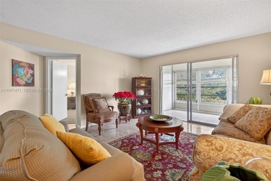 Best priced, largest golf course facing 2/2 condo in Century on  in Florida - for sale on GolfHomes.com, golf home, golf lot