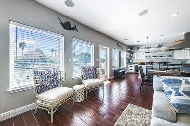 Waterfront canal home located on the shady side of Island on Palmilla Beach Golf Club in Texas - for sale on GolfHomes.com, golf home, golf lot