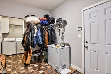 Welcome to this stunning contemporary walk-out rancher nestled on  in  - for sale on GolfHomes.com, golf home, golf lot