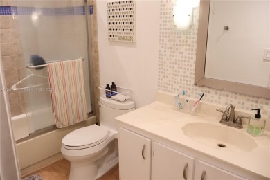 This unit is conveniently located in the center of Doral, close on Jim McLean Signature Course in Florida - for sale on GolfHomes.com, golf home, golf lot
