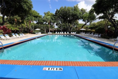 KING 2 BED-2 BATH BEAUTIFULLY REMODELED CORNER CONDO ON OAKS on Palm-Aire Country Club and Resort - The Oaks in Florida - for sale on GolfHomes.com, golf home, golf lot