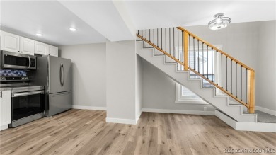 Check out this beautiful home located in a peaceful no wake cove on Seasons Ridge At Four Seasons in Missouri - for sale on GolfHomes.com, golf home, golf lot