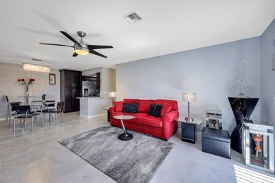 Discover this charming 2-bed, 2-bath villa in the Bundled Golf on The Glades Golf and Country Club in Florida - for sale on GolfHomes.com, golf home, golf lot