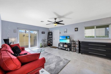 Discover this charming 2-bed, 2-bath villa in the Bundled Golf on The Glades Golf and Country Club in Florida - for sale on GolfHomes.com, golf home, golf lot