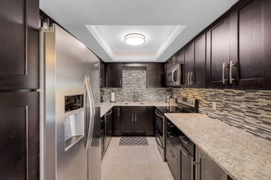 Discover this charming 2-bed, 2-bath villa in the Bundled Golf on The Glades Golf and Country Club in Florida - for sale on GolfHomes.com, golf home, golf lot