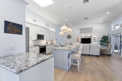 MAKE YOURSELF AT HOME IN THIS INVITING 3BR/2BA/2CG+ GOLF CART on The Legacy Golf and Tennis Club in Florida - for sale on GolfHomes.com, golf home, golf lot