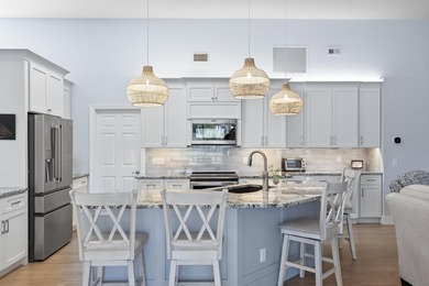 MAKE YOURSELF AT HOME IN THIS INVITING 3BR/2BA/2CG+ GOLF CART on The Legacy Golf and Tennis Club in Florida - for sale on GolfHomes.com, golf home, golf lot