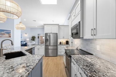 MAKE YOURSELF AT HOME IN THIS INVITING 3BR/2BA/2CG+ GOLF CART on The Legacy Golf and Tennis Club in Florida - for sale on GolfHomes.com, golf home, golf lot