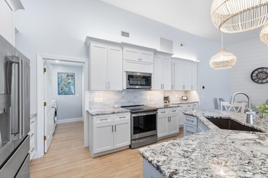 MAKE YOURSELF AT HOME IN THIS INVITING 3BR/2BA/2CG+ GOLF CART on The Legacy Golf and Tennis Club in Florida - for sale on GolfHomes.com, golf home, golf lot