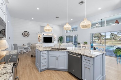 MAKE YOURSELF AT HOME IN THIS INVITING 3BR/2BA/2CG+ GOLF CART on The Legacy Golf and Tennis Club in Florida - for sale on GolfHomes.com, golf home, golf lot