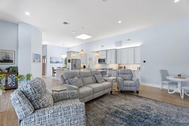 MAKE YOURSELF AT HOME IN THIS INVITING 3BR/2BA/2CG+ GOLF CART on The Legacy Golf and Tennis Club in Florida - for sale on GolfHomes.com, golf home, golf lot