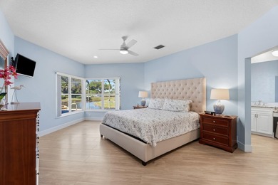 MAKE YOURSELF AT HOME IN THIS INVITING 3BR/2BA/2CG+ GOLF CART on The Legacy Golf and Tennis Club in Florida - for sale on GolfHomes.com, golf home, golf lot