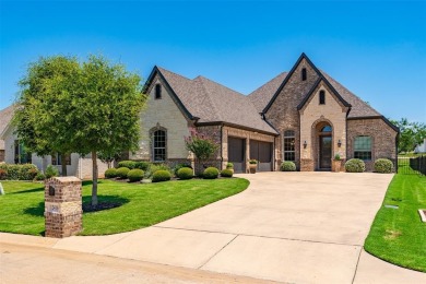 Discover your dream lifestyle with this pristine single-story on The Golf Club at Resort Eagle Mountain Lake in Texas - for sale on GolfHomes.com, golf home, golf lot