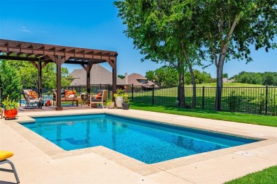 Discover your dream lifestyle with this pristine single-story on The Golf Club at Resort Eagle Mountain Lake in Texas - for sale on GolfHomes.com, golf home, golf lot