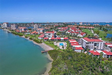 Beautiful water views abound from this 2nd floor villa in the on Isla Del Sol Yacht and Country Club in Florida - for sale on GolfHomes.com, golf home, golf lot