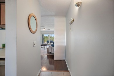 Beautiful water views abound from this 2nd floor villa in the on Isla Del Sol Yacht and Country Club in Florida - for sale on GolfHomes.com, golf home, golf lot