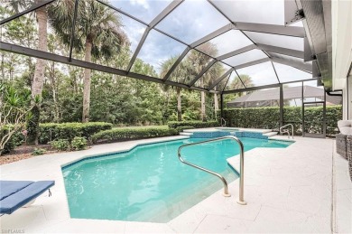 SPECTACULAR!! Beautifully and meticulously updated Kingfisher on Shadow Wood Country Club in Florida - for sale on GolfHomes.com, golf home, golf lot