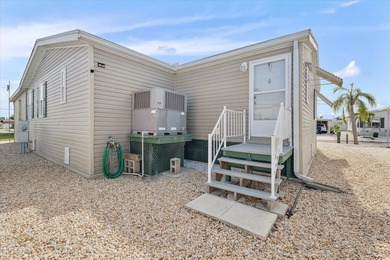 BEAUTIFUL TRIPLE-WIDE HOME on OVERSIZED 1.5 Lots in TROPIC ISLES on Terra Ceia Golf and Country Club in Florida - for sale on GolfHomes.com, golf home, golf lot