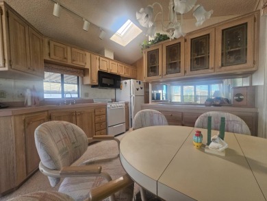 This exceptional property is not only super clean and spacious on Viewpoint Golf Resort in Arizona - for sale on GolfHomes.com, golf home, golf lot