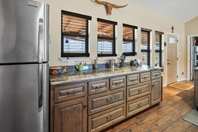 Welcome to 202 Bluebonnet Drive; your perfect Lake Home Retreat! on San Felipe Country Club in Texas - for sale on GolfHomes.com, golf home, golf lot