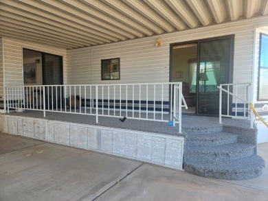 This exceptional property is not only super clean and spacious on Viewpoint Golf Resort in Arizona - for sale on GolfHomes.com, golf home, golf lot