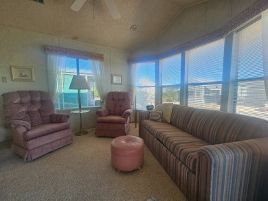 This exceptional property is not only super clean and spacious on Viewpoint Golf Resort in Arizona - for sale on GolfHomes.com, golf home, golf lot