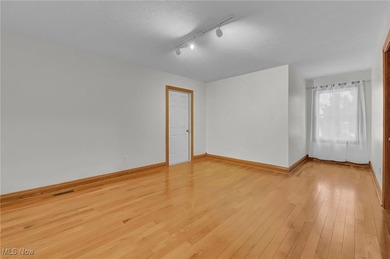 Rare opportunity for a main-level primary home on one of on Grey Hawk Golf Club in Ohio - for sale on GolfHomes.com, golf home, golf lot