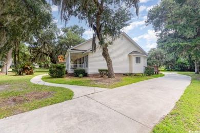 Welcome to 60 Wraggs Ferry Road, nestled within the prestigious on Wedgefield Plantation Golf Club in South Carolina - for sale on GolfHomes.com, golf home, golf lot