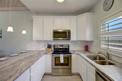 This amazing Beachside townhome hits the mark with its location! on Palmilla Beach Golf Club in Texas - for sale on GolfHomes.com, golf home, golf lot