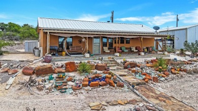 Welcome to 202 Bluebonnet Drive; your perfect Lake Home Retreat! on San Felipe Country Club in Texas - for sale on GolfHomes.com, golf home, golf lot