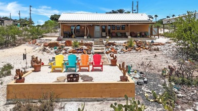 Welcome to 202 Bluebonnet Drive; your perfect Lake Home Retreat! on San Felipe Country Club in Texas - for sale on GolfHomes.com, golf home, golf lot