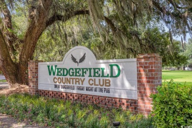 Welcome to 60 Wraggs Ferry Road, nestled within the prestigious on Wedgefield Plantation Golf Club in South Carolina - for sale on GolfHomes.com, golf home, golf lot