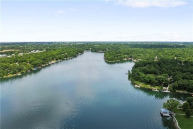 Nice weekend home on 3 LOTS (649, 650, and 651) on popular Buck on Linn Valley Lakes - Deer Trace Golf Course in Kansas - for sale on GolfHomes.com, golf home, golf lot