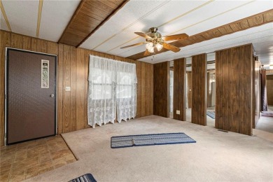 Nice weekend home on 3 LOTS (649, 650, and 651) on popular Buck on Linn Valley Lakes - Deer Trace Golf Course in Kansas - for sale on GolfHomes.com, golf home, golf lot