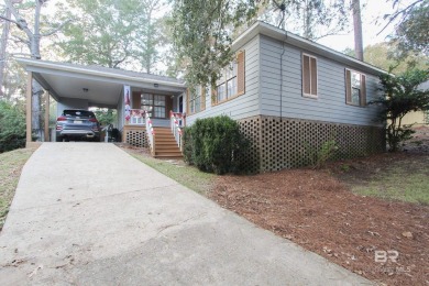 LOOK AT THIS DEAL!!!!! Charming 3-Bed, 2-Bath Home in Lake on Lake Forest Yacht and Country Club in Alabama - for sale on GolfHomes.com, golf home, golf lot