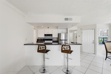 Welcome to this FIRST-FLOOR, 2 bedroom, 2 bathroom, condo on Feather Sound Country Club in Florida - for sale on GolfHomes.com, golf home, golf lot