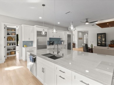 Luxury, efficiency, and elegance converge in this 2022 on Black Diamond Ranch Golf Course in Florida - for sale on GolfHomes.com, golf home, golf lot
