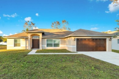 **Welcome Home** Move-in ready 3-bedroom, 1 office(can be used on Wedgefield Golf Club in Florida - for sale on GolfHomes.com, golf home, golf lot