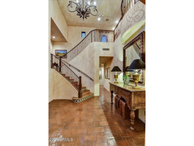Experience luxury and ease in this rare semi-custom villa on Superstition Mountain Club - Lost Gold in Arizona - for sale on GolfHomes.com, golf home, golf lot
