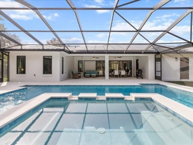 Luxury, efficiency, and elegance converge in this 2022 on Black Diamond Ranch Golf Course in Florida - for sale on GolfHomes.com, golf home, golf lot