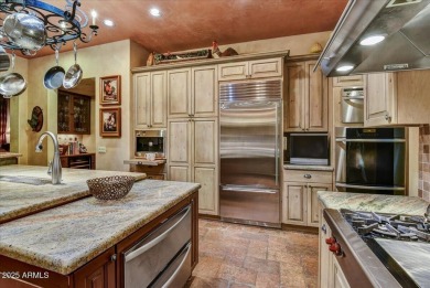 Experience luxury and ease in this rare semi-custom villa on Superstition Mountain Club - Lost Gold in Arizona - for sale on GolfHomes.com, golf home, golf lot