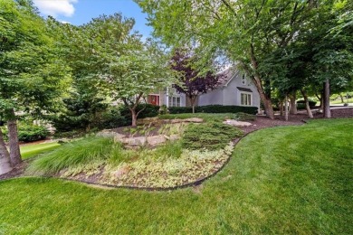 Remarkable estate home nestled on a private, wooded lot in the on Shadow Glen Golf Club in Kansas - for sale on GolfHomes.com, golf home, golf lot