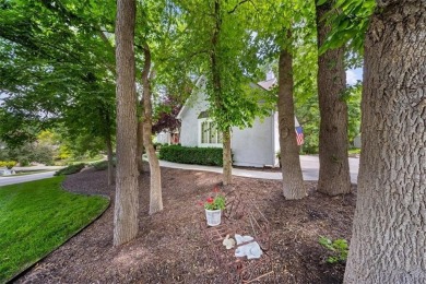 Remarkable estate home nestled on a private, wooded lot in the on Shadow Glen Golf Club in Kansas - for sale on GolfHomes.com, golf home, golf lot