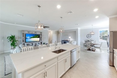 Welcome to this stunning coach home in the highly sought-after on Bonita National Golf Course in Florida - for sale on GolfHomes.com, golf home, golf lot