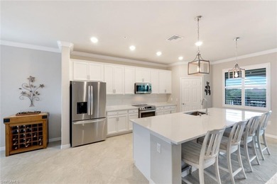 Welcome to this stunning coach home in the highly sought-after on Bonita National Golf Course in Florida - for sale on GolfHomes.com, golf home, golf lot