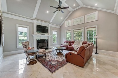 Positioned on a quiet cul-de-sac overlooking the 17th green on TPC At Sugarloaf Golf Club in Georgia - for sale on GolfHomes.com, golf home, golf lot
