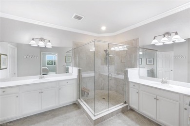 Welcome to this stunning coach home in the highly sought-after on Bonita National Golf Course in Florida - for sale on GolfHomes.com, golf home, golf lot