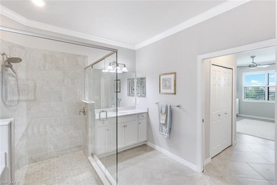 Welcome to this stunning coach home in the highly sought-after on Bonita National Golf Course in Florida - for sale on GolfHomes.com, golf home, golf lot