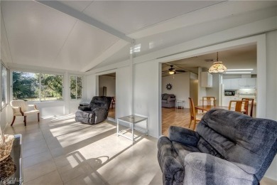 Remodeled with a new roof, new garage for golf cart, and a on Lake Fairways Country Club in Florida - for sale on GolfHomes.com, golf home, golf lot